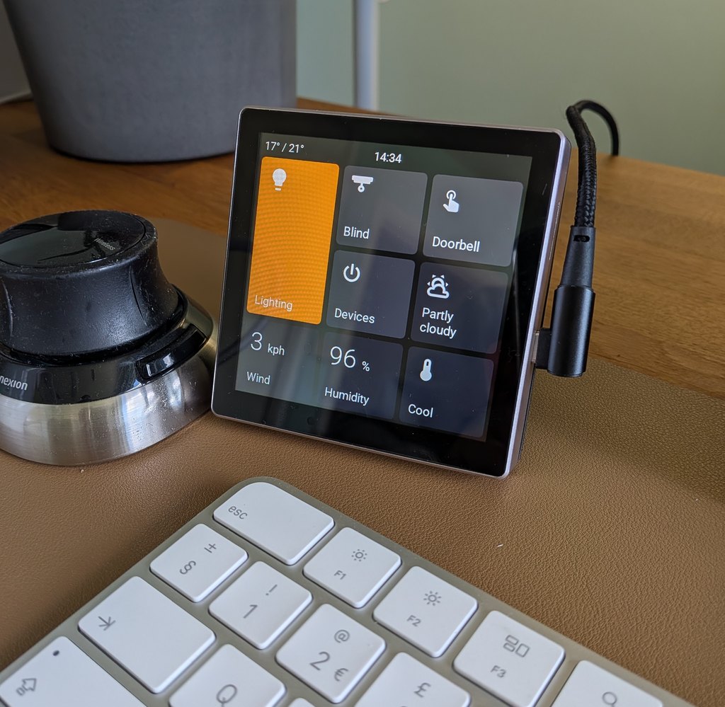 Basalt on the 4-inch 4848S040: square home screen with temperature, clock, and control tiles