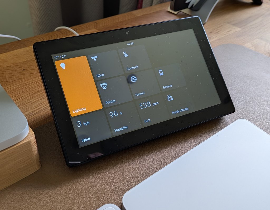 Basalt on a 7-inch touchscreen: home screen with temperature, clock, and control tiles